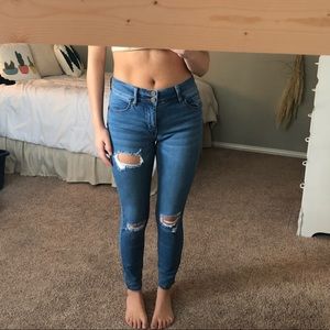 Ripped light wash denim jeans